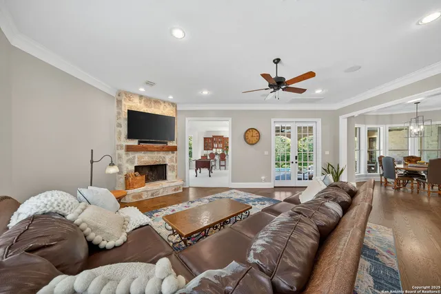 a living room with furniture and a rug