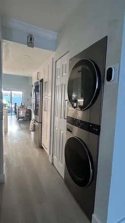 a view of a storage & utility room with washer and dryer