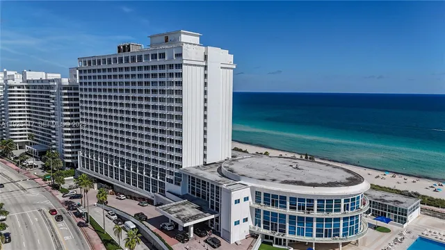 a building view with a big yard