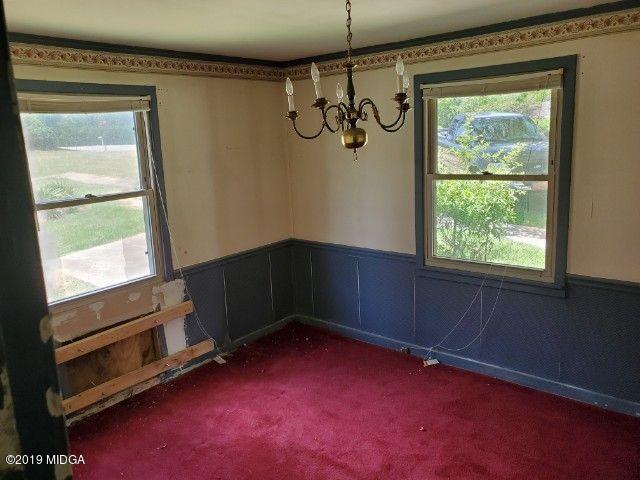 1690 Upper River Road Macon, GA 31211 - Photo 4 of 6 a view of an empty room with a window