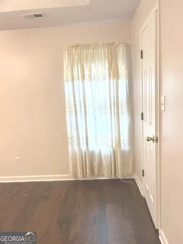 a bathroom with a toilet a sink and a bathtub