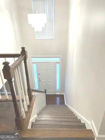 a view of a bathroom with wooden floor