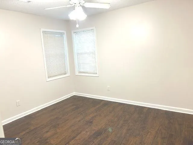 a view of a house with a garden