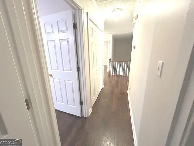 a view of a livingroom with wooden floor
