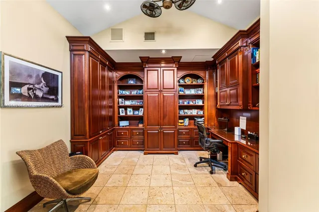 a view of a entryway with furniture and chandelier