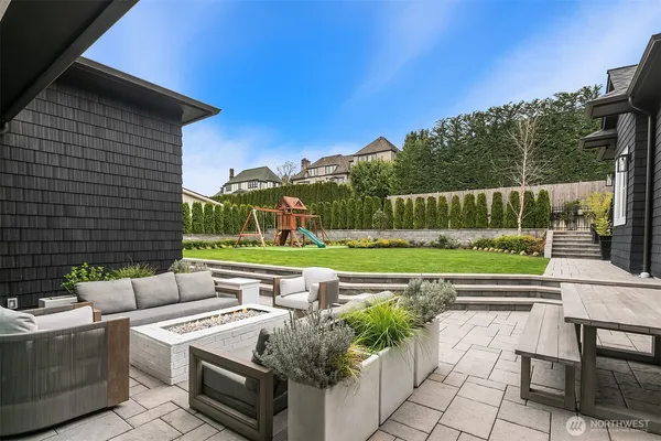 a view of swimming pool with outdoor seating