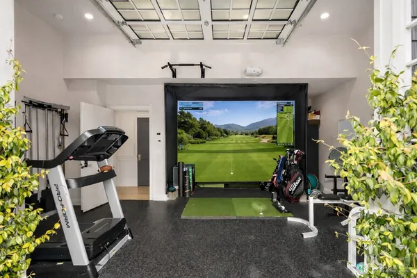 a room with furniture and a flat screen tv