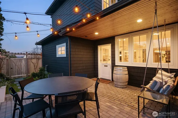 a backyard of a house with seating space