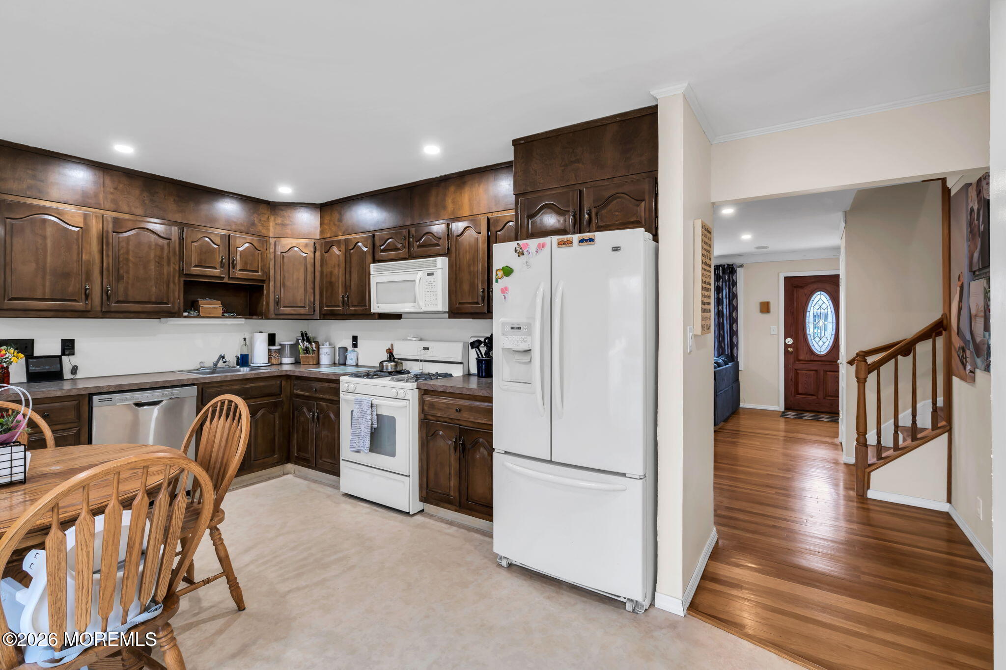 28 Oregon Avenue Jackson, NJ 08527 - Photo 11 of 33 a kitchen with stainless steel appliances granite countertop a refrigerator stove microwave and sink