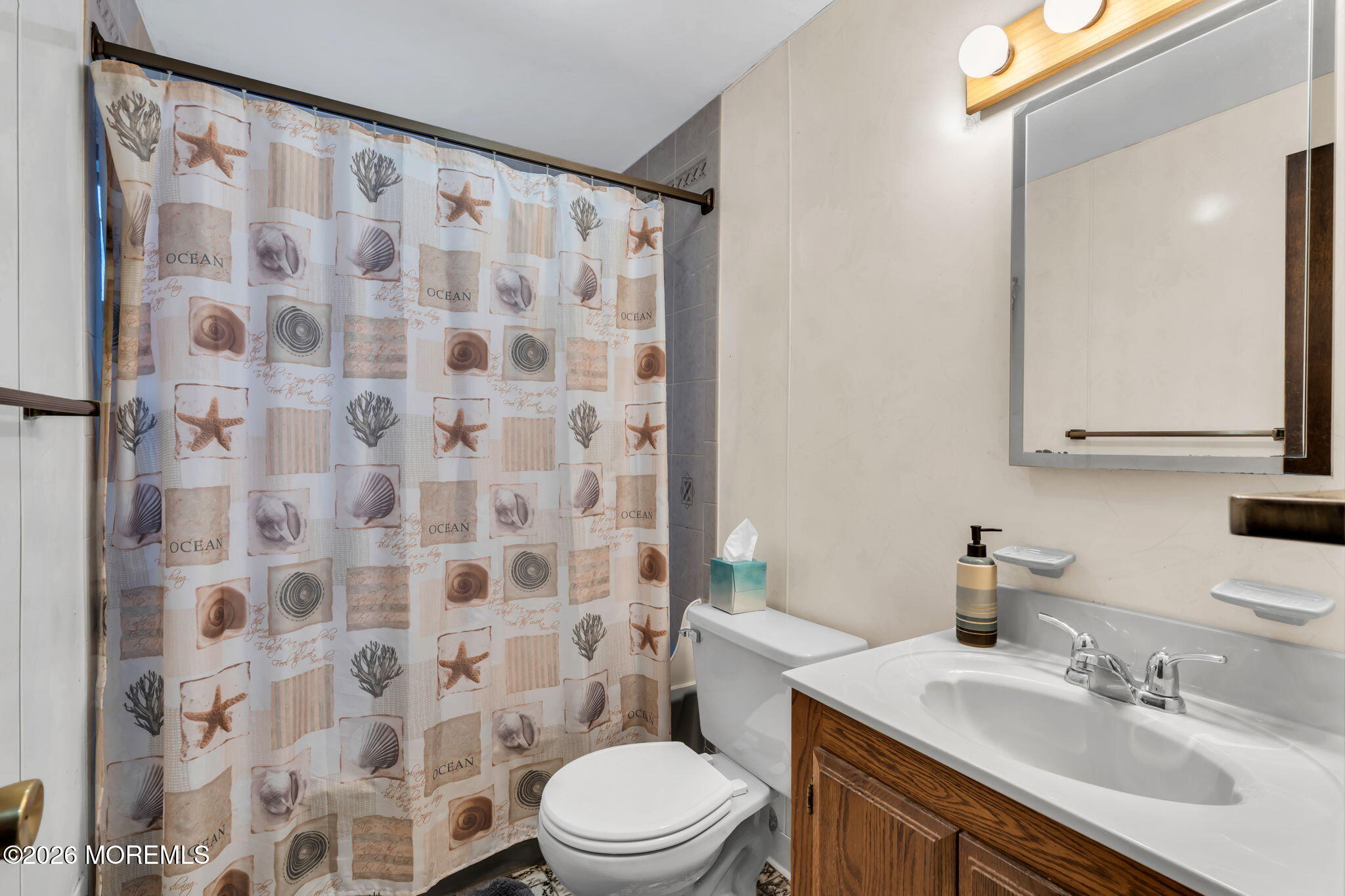 28 Oregon Avenue Jackson, NJ 08527 - Photo 16 of 33 a bathroom with a sink and a mirror