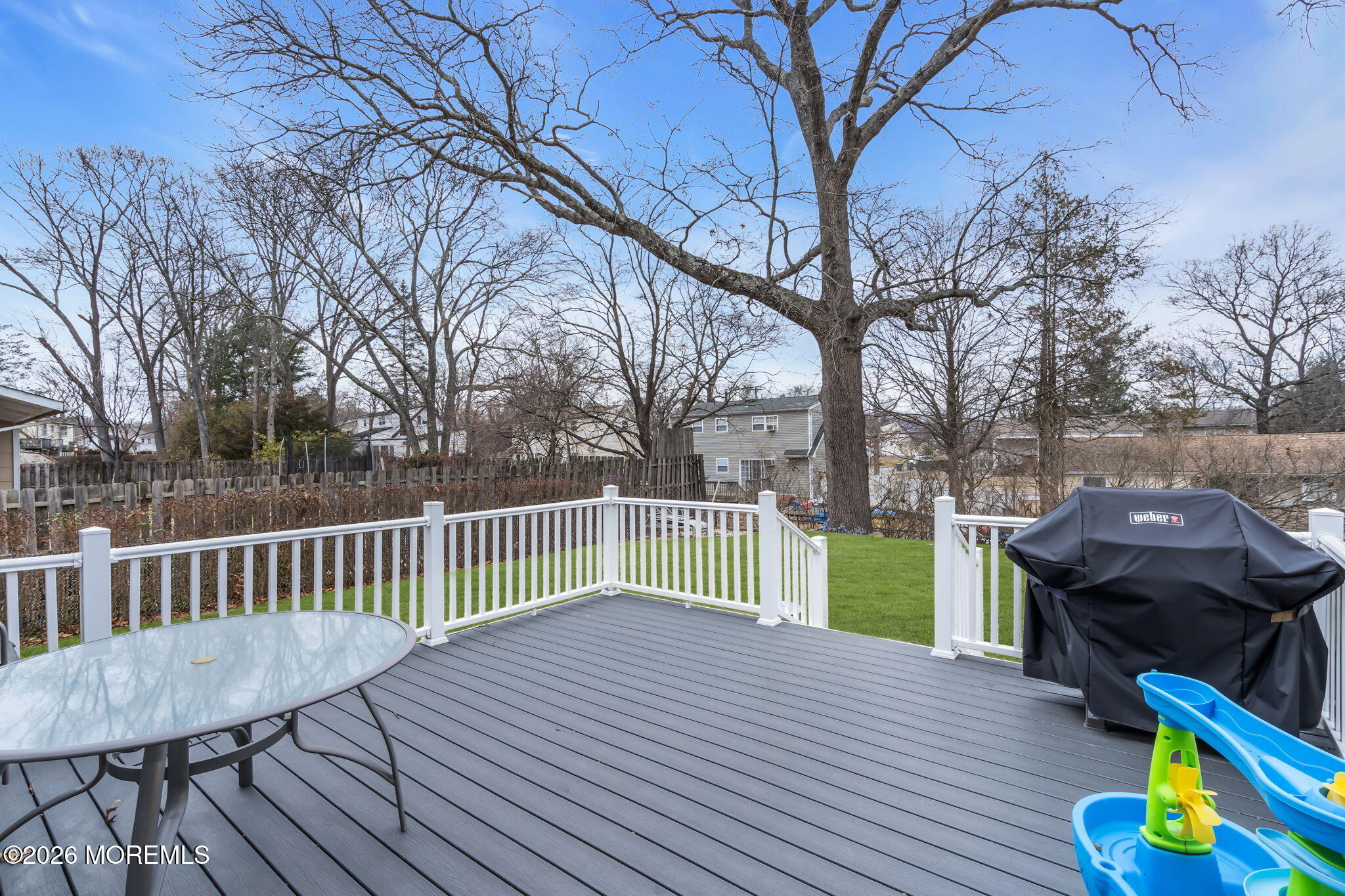 28 Oregon Avenue Jackson, NJ 08527 - Photo 26 of 33 a view of a deck with table and chairs and wooden floor