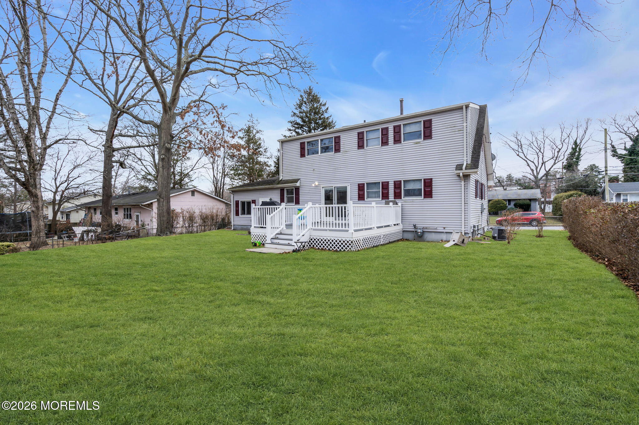 28 Oregon Avenue Jackson, NJ 08527 - Photo 33 of 33 a view of a house with backyard and a tree
