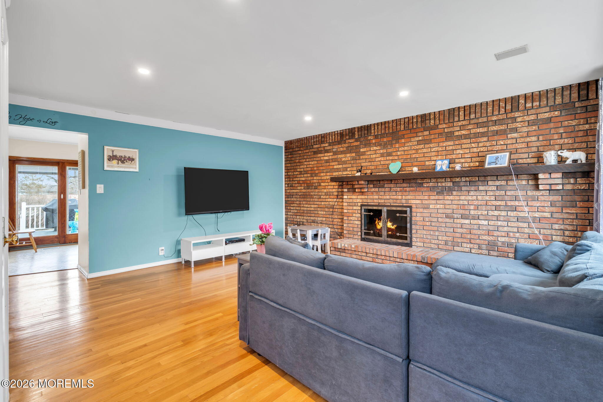 28 Oregon Avenue Jackson, NJ 08527 - Photo 7 of 33 a living room with furniture and a flat screen tv