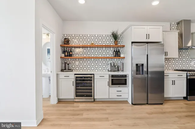 a view of kitchen island wooden floor