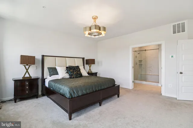 a view of a bedroom with closet area