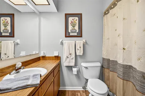 a view of a livingroom with workspace and a couch