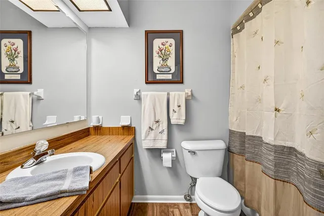 a view of a livingroom with workspace and a couch