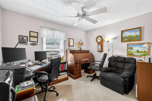 a living room with furniture and flat screen tv