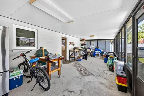 a view of a backyard with pathway