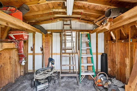 a view of backyard with patio