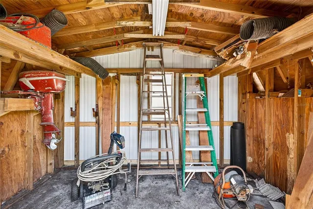 a view of backyard with patio