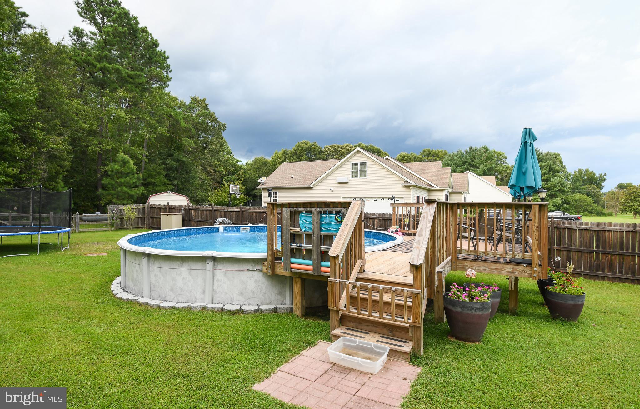 14585 Round Hill Road King George, VA 22485 - Photo 11 of 54 Deck around pool