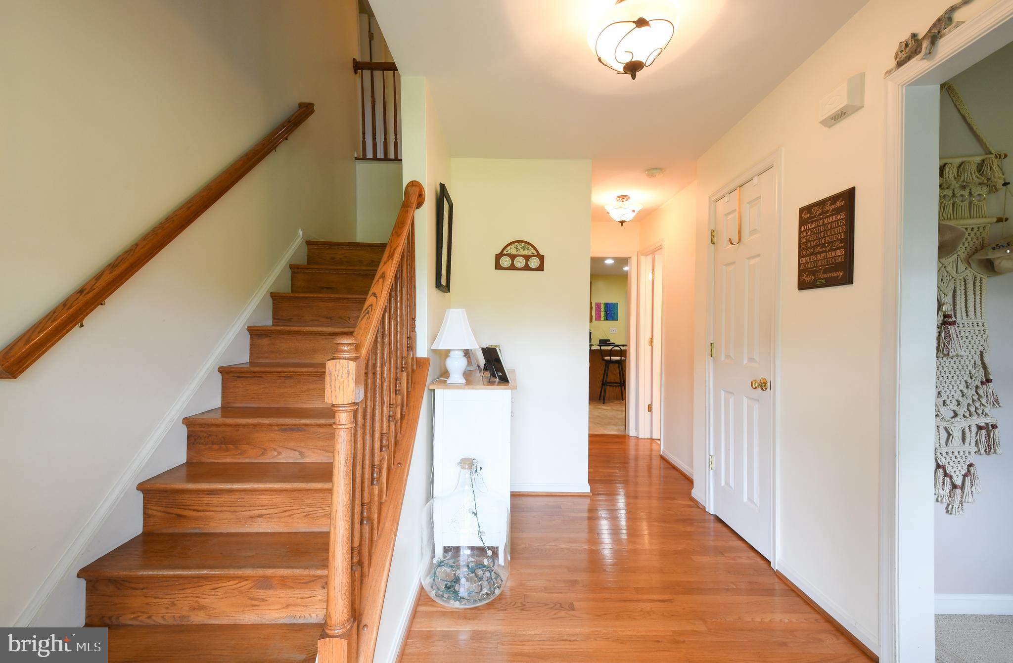 14585 Round Hill Road King George, VA 22485 - Photo 21 of 54 Hardwood foyer with beautiful wood stairway