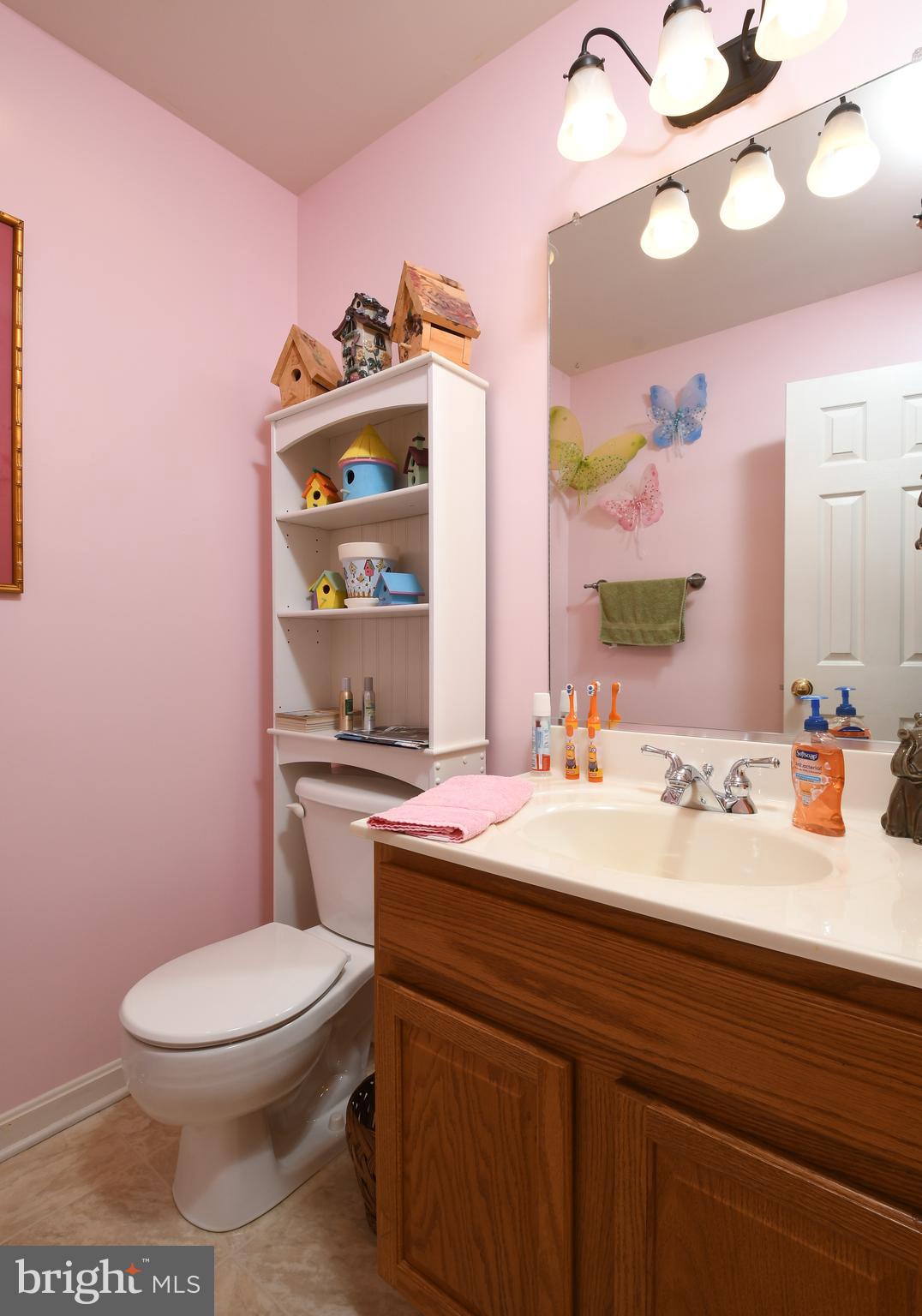 14585 Round Hill Road King George, VA 22485 - Photo 36 of 54 Powder room on main level