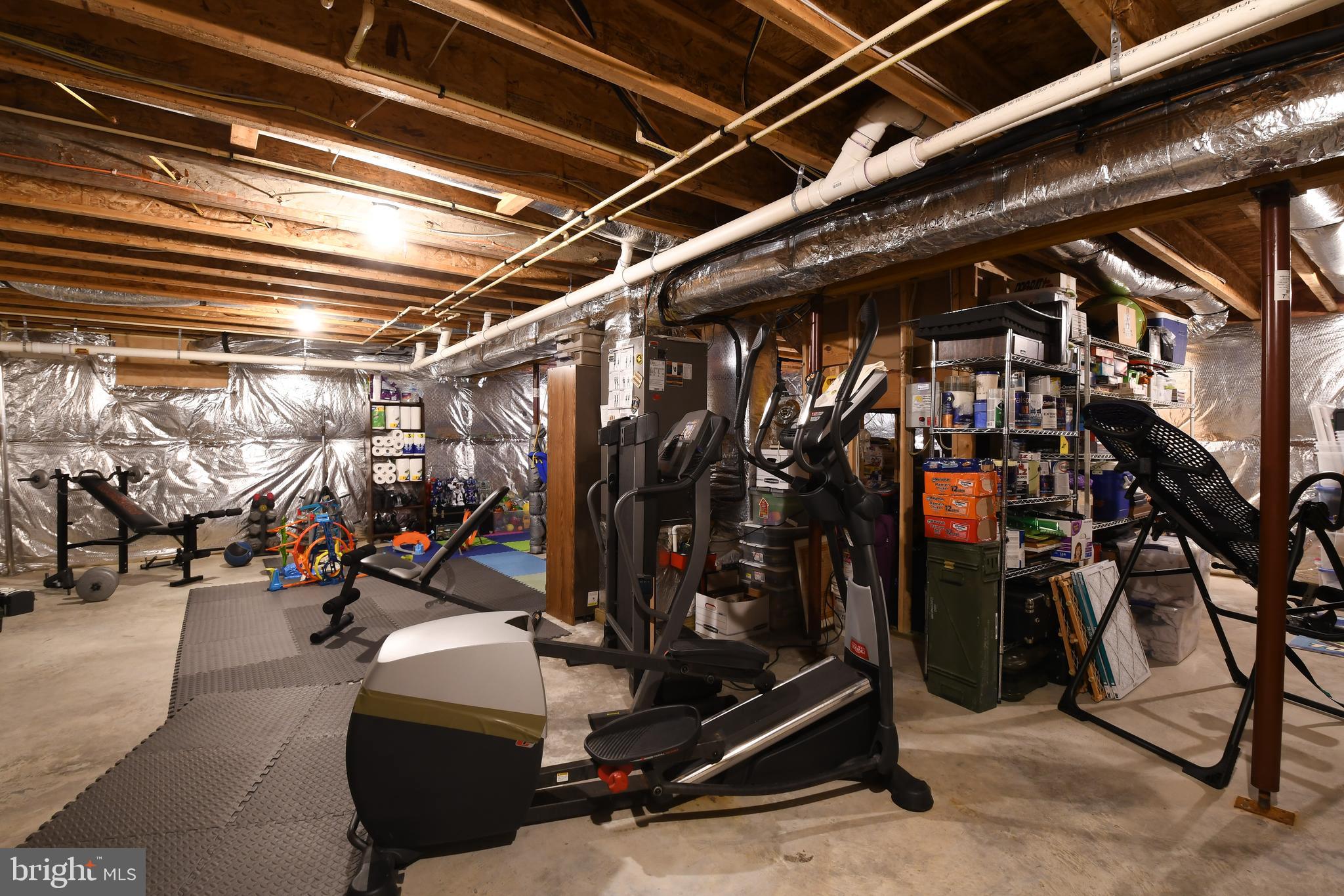 14585 Round Hill Road King George, VA 22485 - Photo 52 of 54 Large unfinished basement perfect for gym space