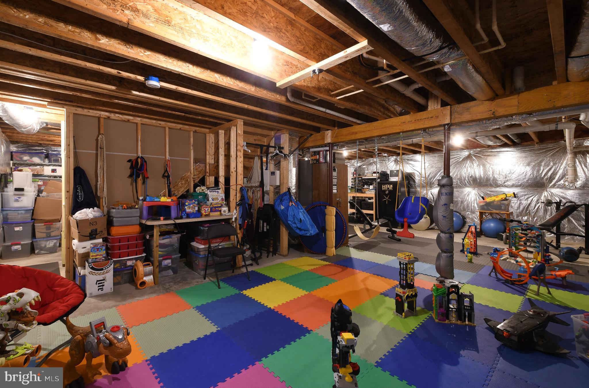 14585 Round Hill Road King George, VA 22485 - Photo 54 of 54 Unfinished basement perfect for play space