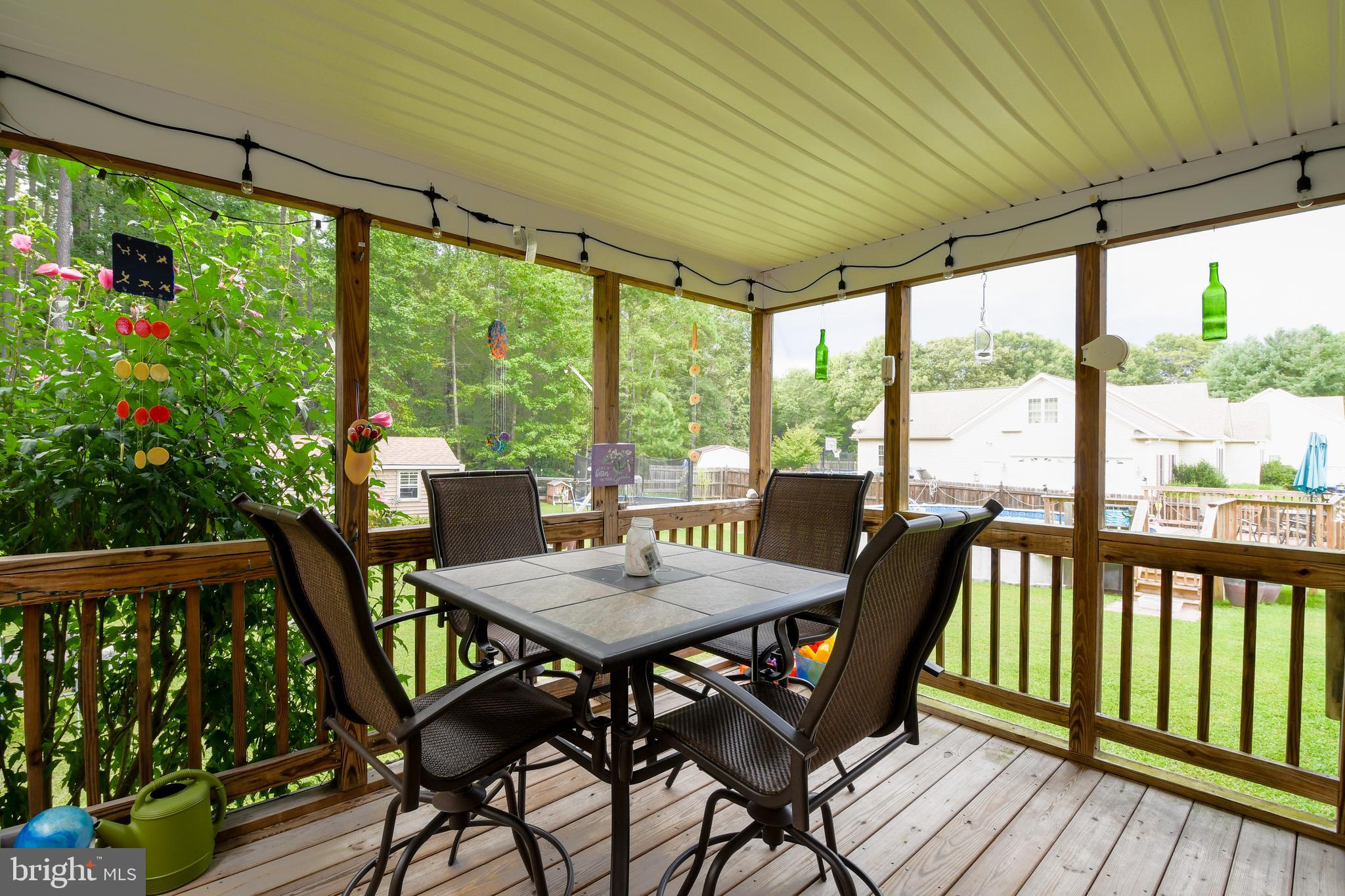 14585 Round Hill Road King George, VA 22485 - Photo 10 of 54 Screened in porch off back of home
