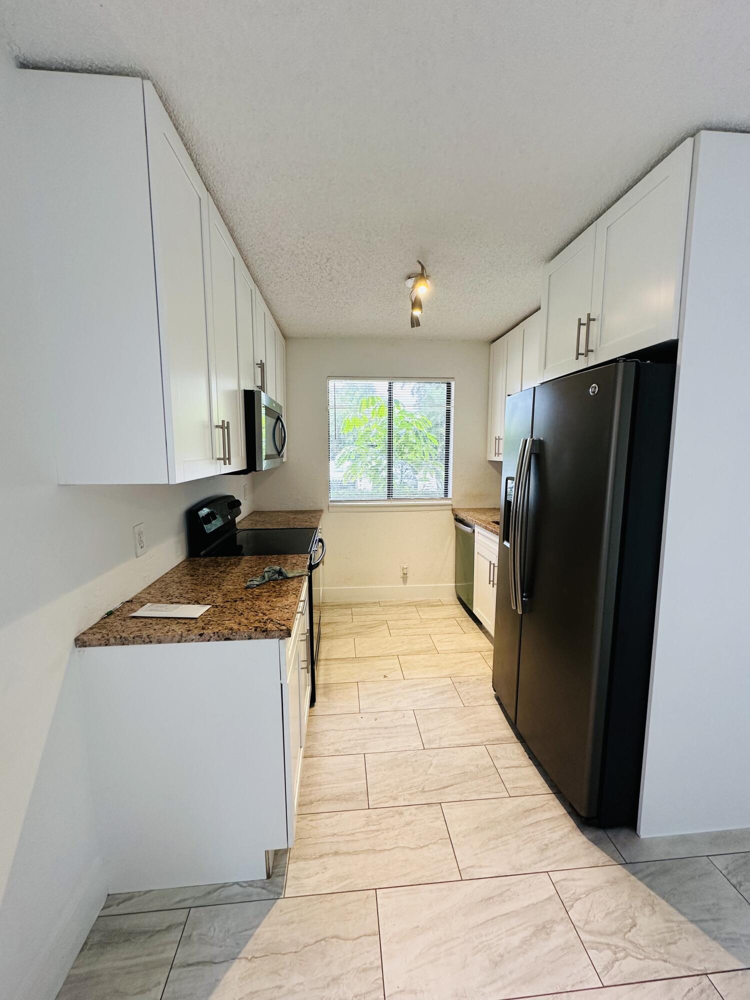 300 Nottingham Circle, Unit E Greenacres, FL 33463 - Photo 4 of 10 IMG_0458