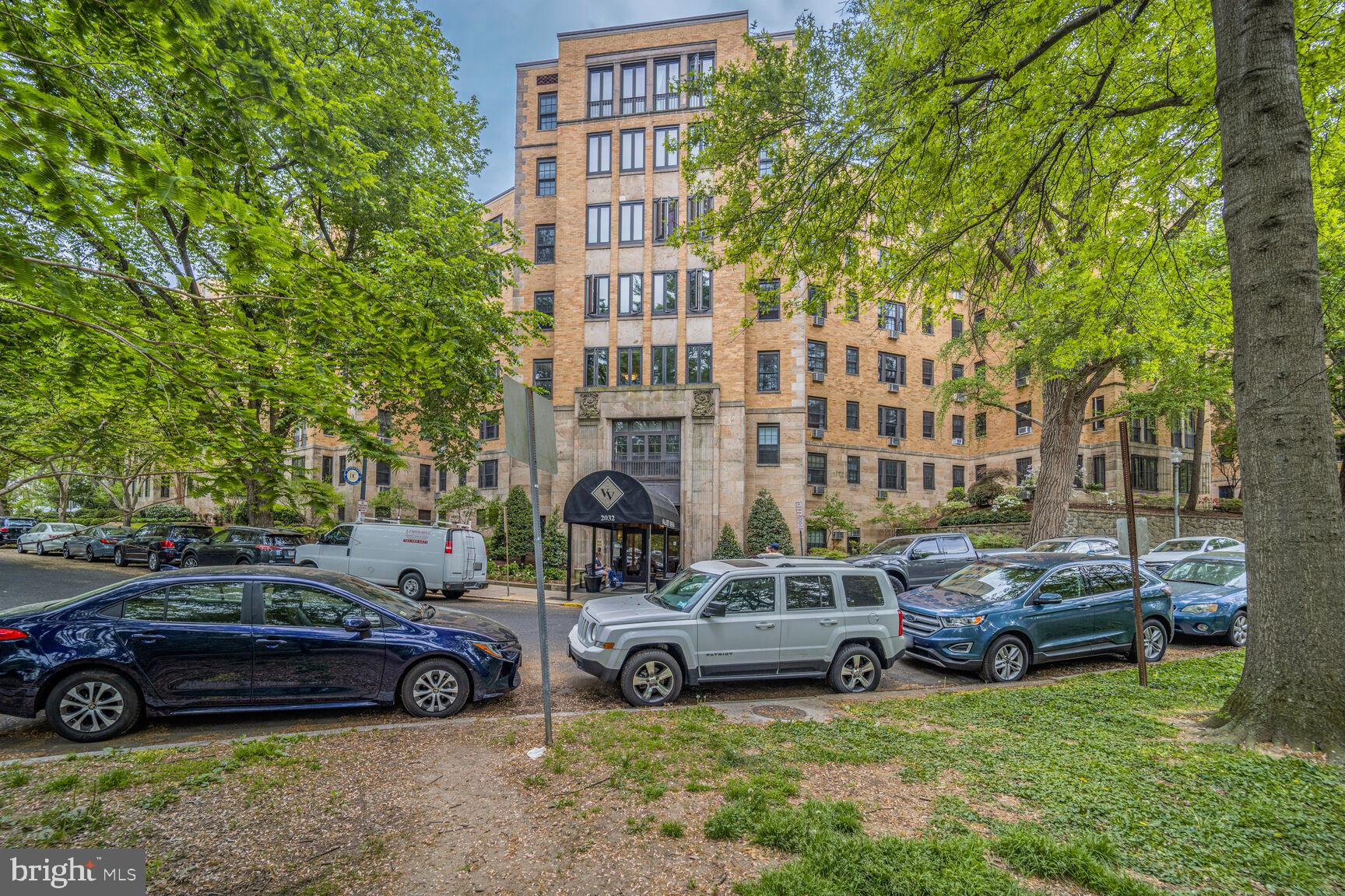 2032 Belmont Road Northwest, Unit 336 Washington, DC 20009 - Photo 1 of 23 a view of a cars parked in front of a building
