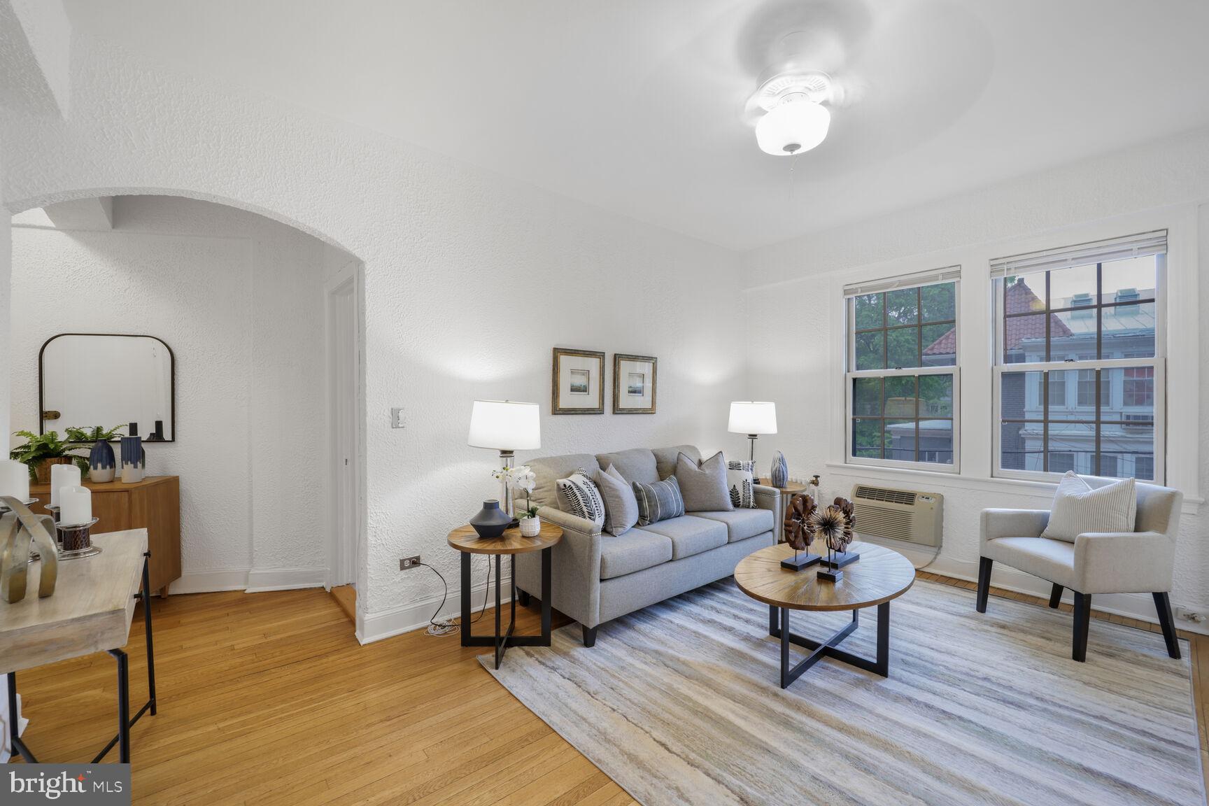 2032 Belmont Road Northwest, Unit 336 Washington, DC 20009 - Photo 4 of 23 a living room with furniture