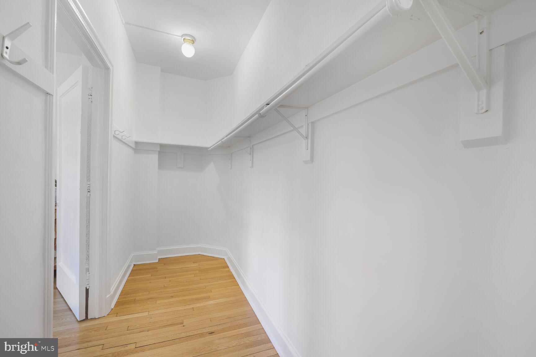 2032 Belmont Road Northwest, Unit 336 Washington, DC 20009 - Photo 7 of 23 a view of wooden floor in a room
