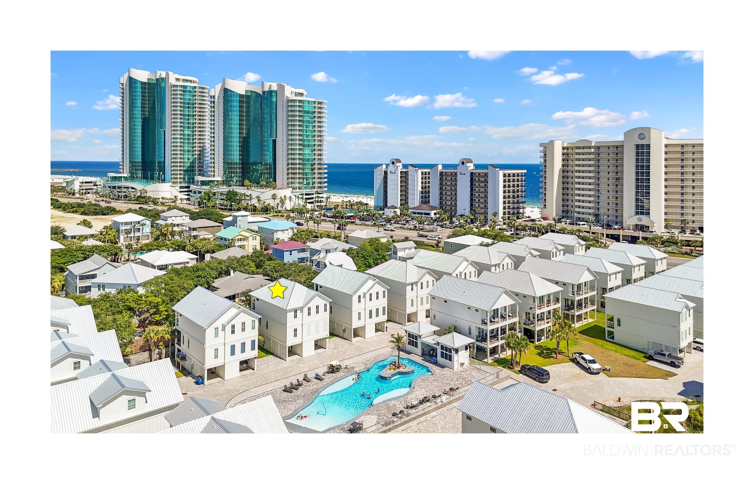 3188 Egret Run Orange Beach, AL 36561 - Photo 1 of 37 Aerial view of a large body of water and a pool