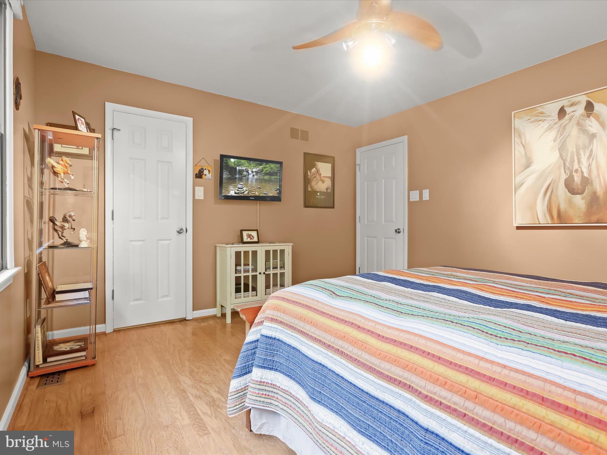 5129 Grave Run Road Manchester, MD 21102 - Photo 33 of 60 a bedroom with a bed and a flat screen tv