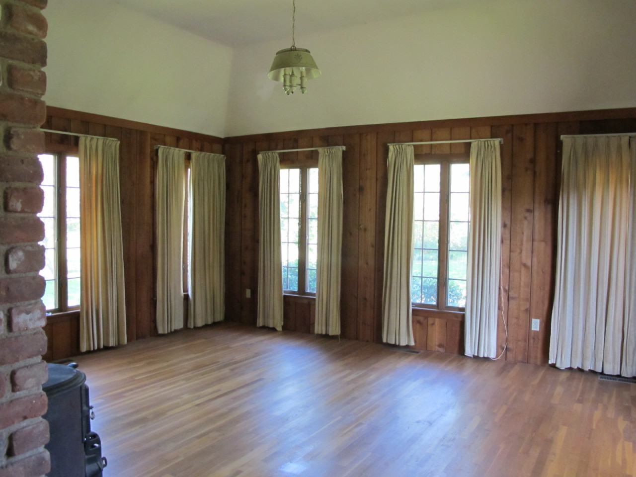 127 Middle Ridge Road New Canaan, CT 06840 - Photo 3 of 9 an empty room with wooden floor and windows