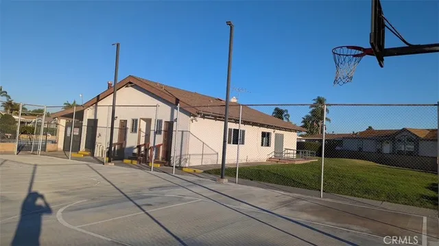 a view of a house next to a yard