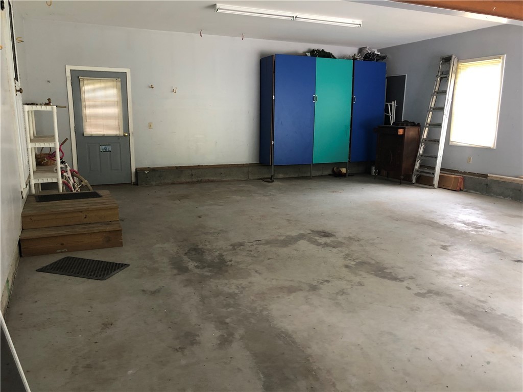 17 Pawcatuck View Road Richmond, RI 02812 - Photo 16 of 21 2 car attached garage oversized with room for storage - door to back yard