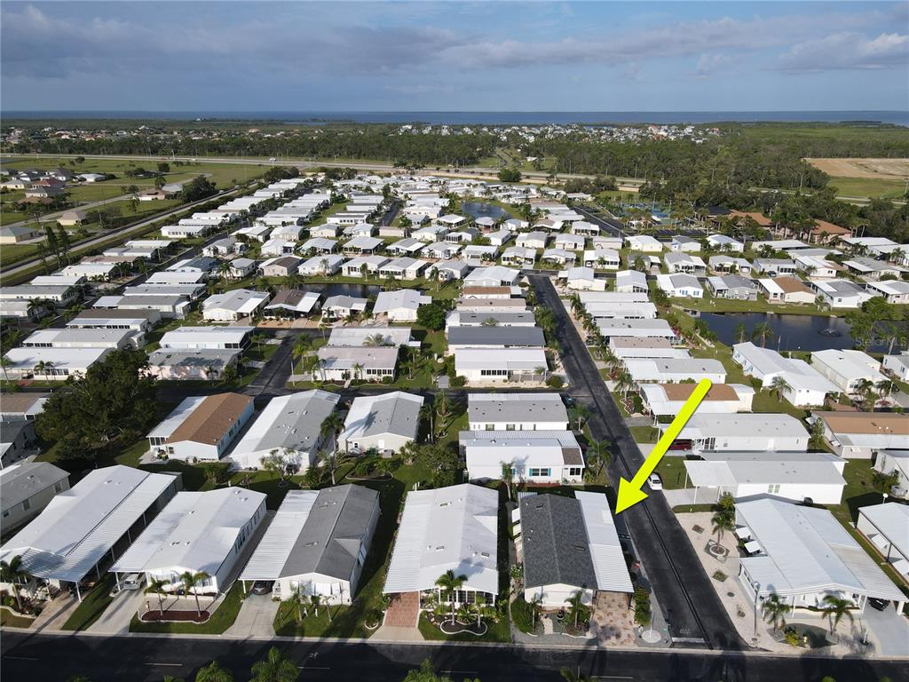 15550 Burnt Store Road, Unit 164 Punta Gorda, FL 33955 - Photo 37 of 44 an aerial view of residential building with lake view