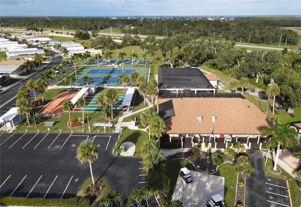 15550 Burnt Store Road, Unit 164 Punta Gorda, FL 33955 - Photo 41 of 44 an aerial view of residential houses with outdoor space