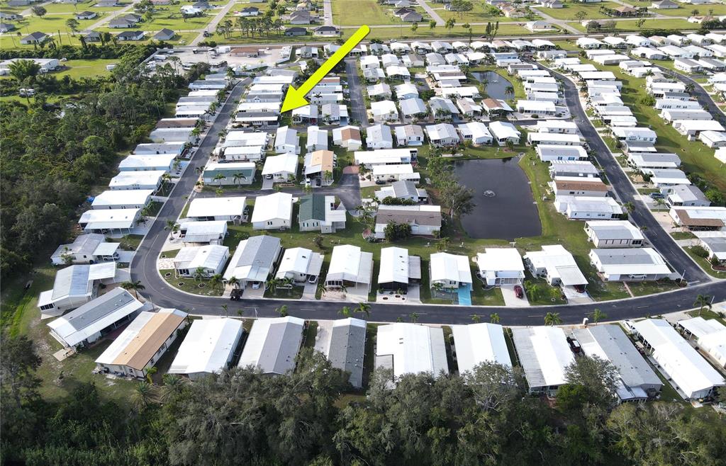 15550 Burnt Store Road, Unit 164 Punta Gorda, FL 33955 - Photo 42 of 44 a view of swimming pool with a yard