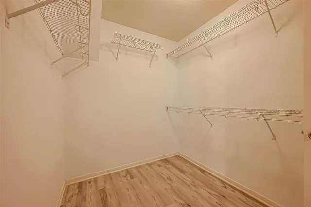 a view of a room with racks on the wall