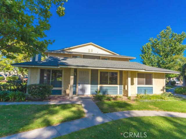 588 Spring Road, Unit 61 Moorpark, CA 93021 - Photo 1 of 1 a front view of a house with a yard