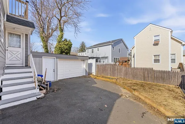 a view of a house with a garage
