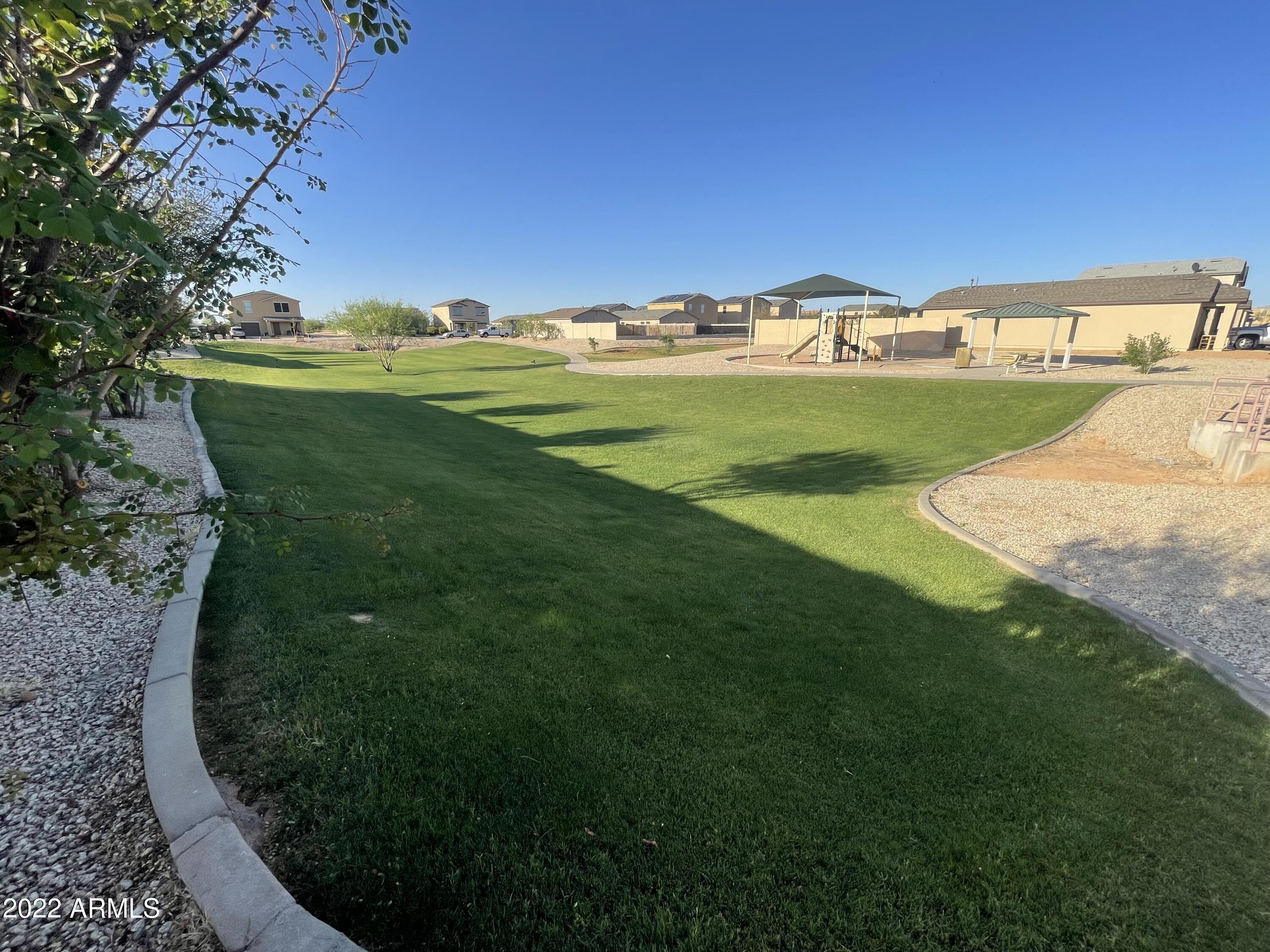119 Dewey Avenue Coolidge, AZ 85128 - Photo 15 of 15 a view of a field with an trees