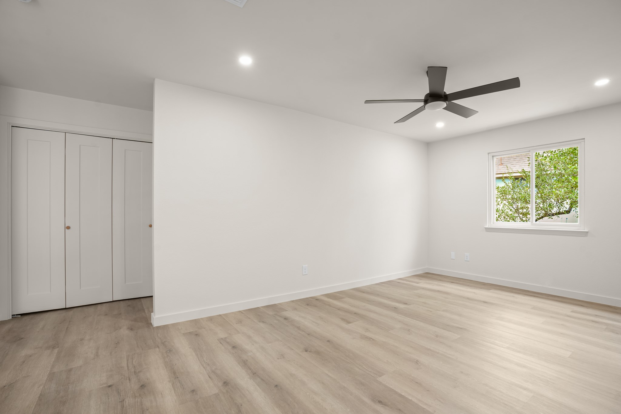 7826 Wheel Rim Circle Austin, TX 78749 - Photo 24 of 38 Gleaming wood flooring complements the crisp, clean walls of this versatile bedroom space.