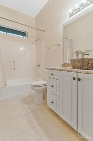 a view of an empty room with a bathroom