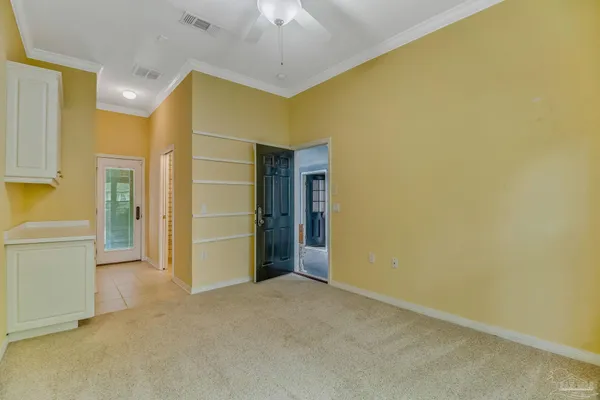 a view of a room with a large window